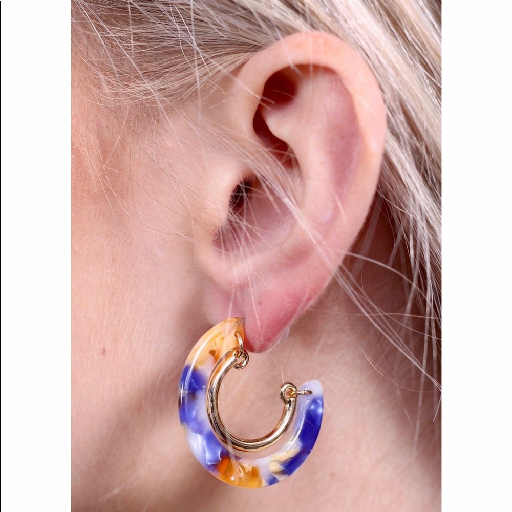 Gold rimmed resin hoop